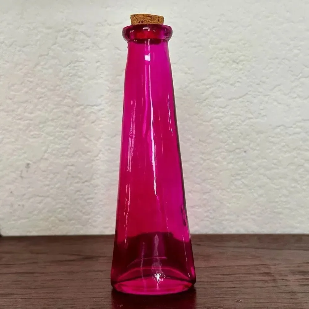 Vintage pink bottle with cork